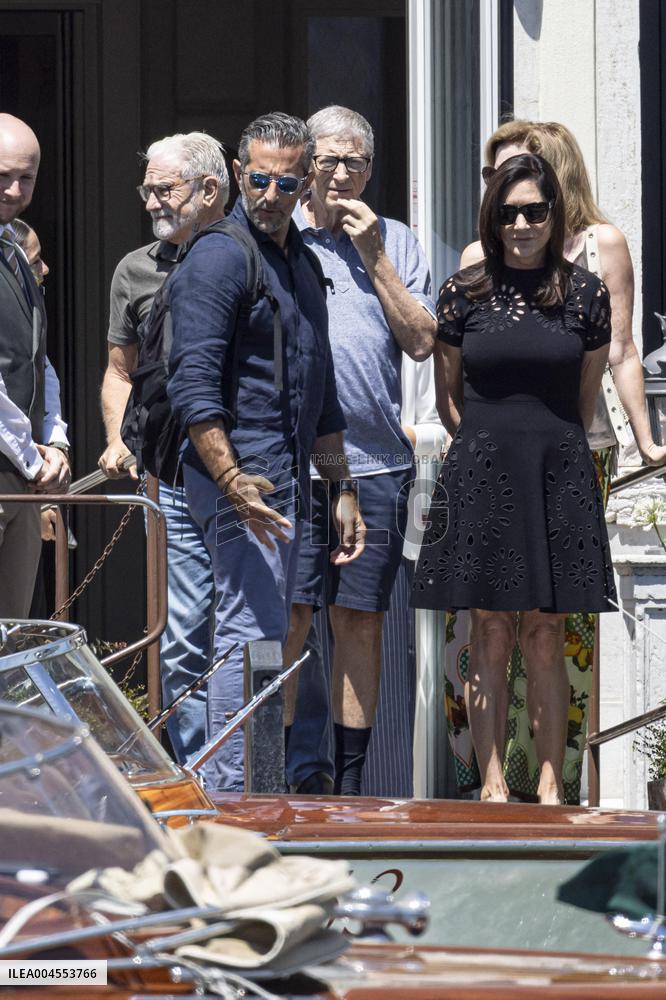 Bill Gates and friends leave St Regis Hotel in Venice