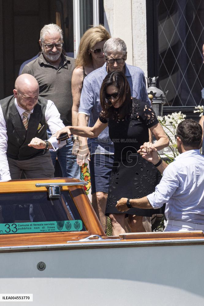 Bill Gates and friends leave St Regis Hotel in Venice