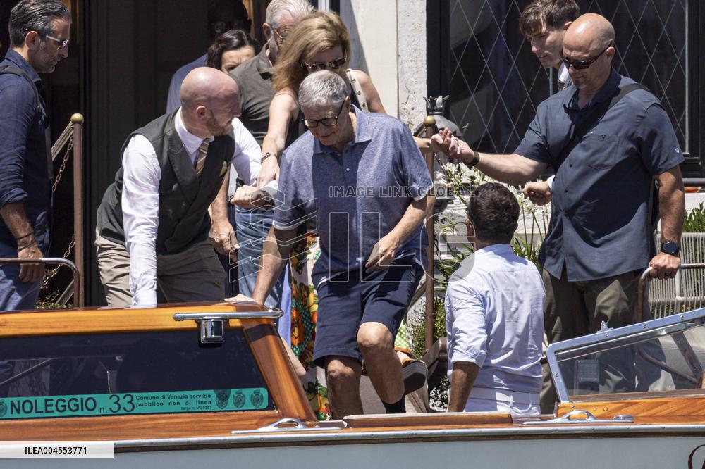 Bill Gates and friends leave St Regis Hotel in Venice