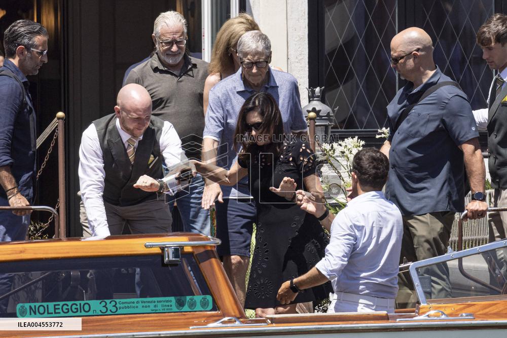 Bill Gates and friends leave St Regis Hotel in Venice