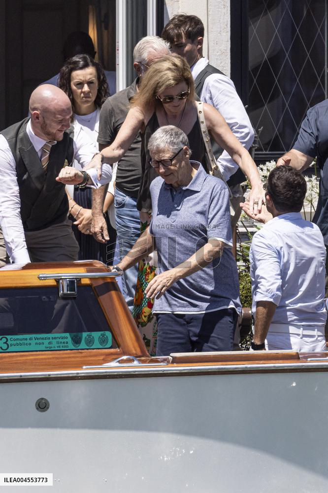Bill Gates and friends leave St Regis Hotel in Venice