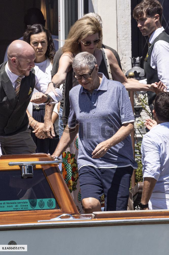 Bill Gates and friends leave St Regis Hotel in Venice