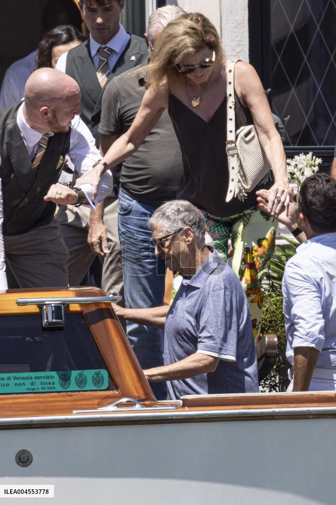 Bill Gates and friends leave St Regis Hotel in Venice