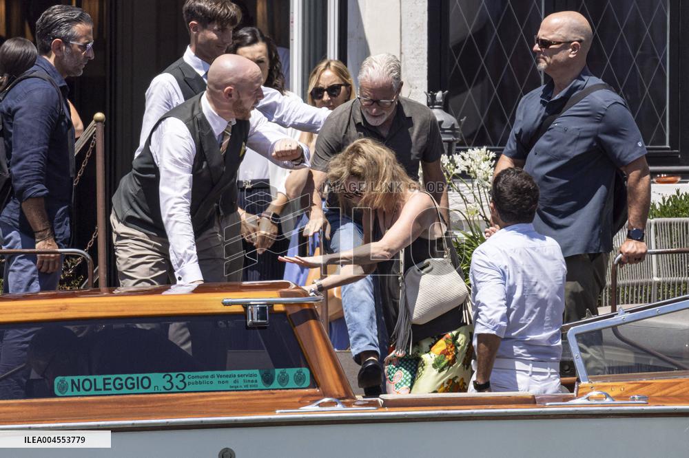 Bill Gates and friends leave St Regis Hotel in Venice