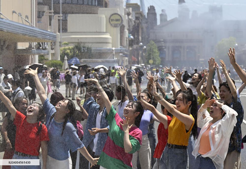 Water splashing at USJ to counter summer heat