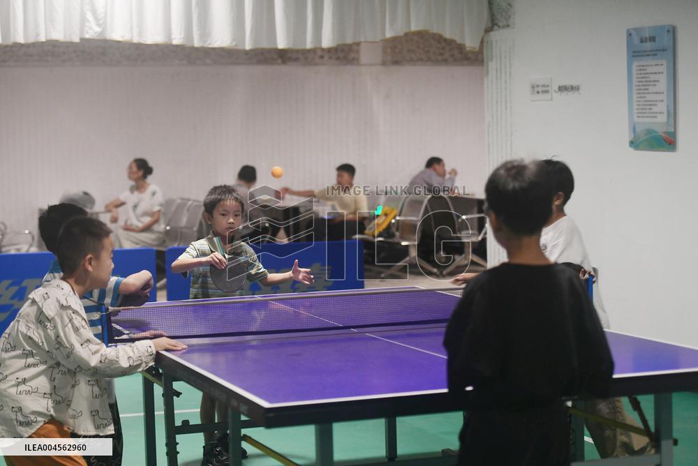 Citizens Enjoy Coolness in The Air-raid Shelter in Hangzhou