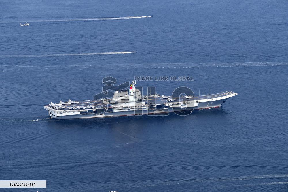 Aircraft Carrier Shandong Sailing In Hong Kong Waters