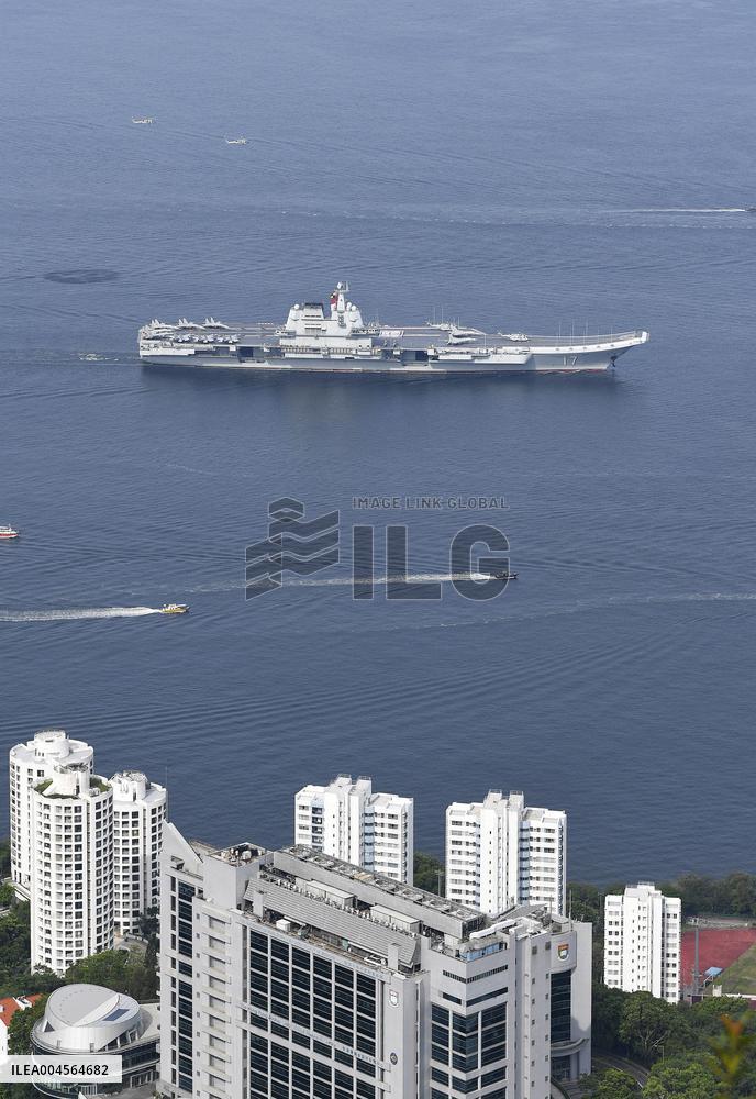 Aircraft Carrier Shandong Sailing In Hong Kong Waters