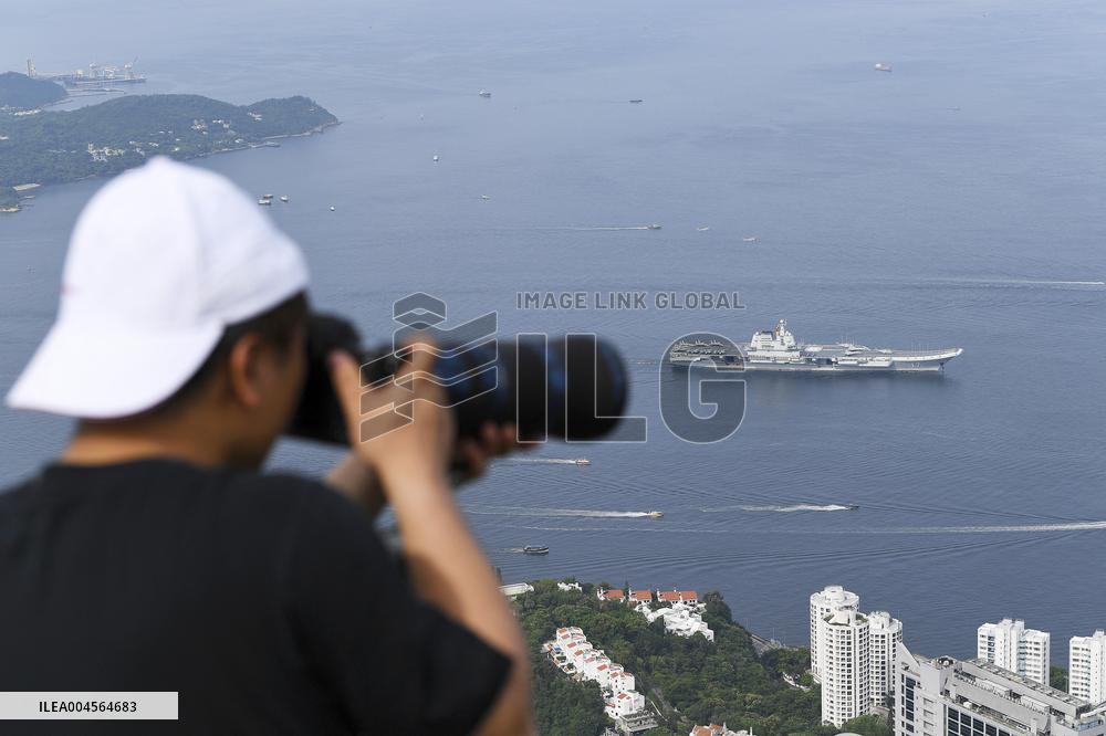 Aircraft Carrier Shandong Sailing In Hong Kong Waters