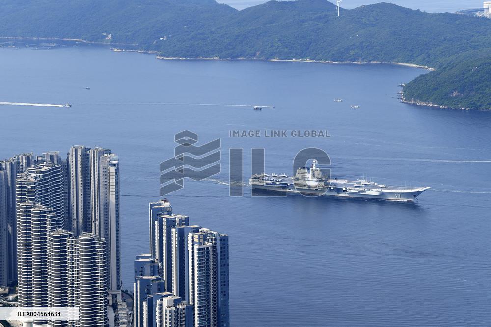 Aircraft Carrier Shandong Sailing In Hong Kong Waters