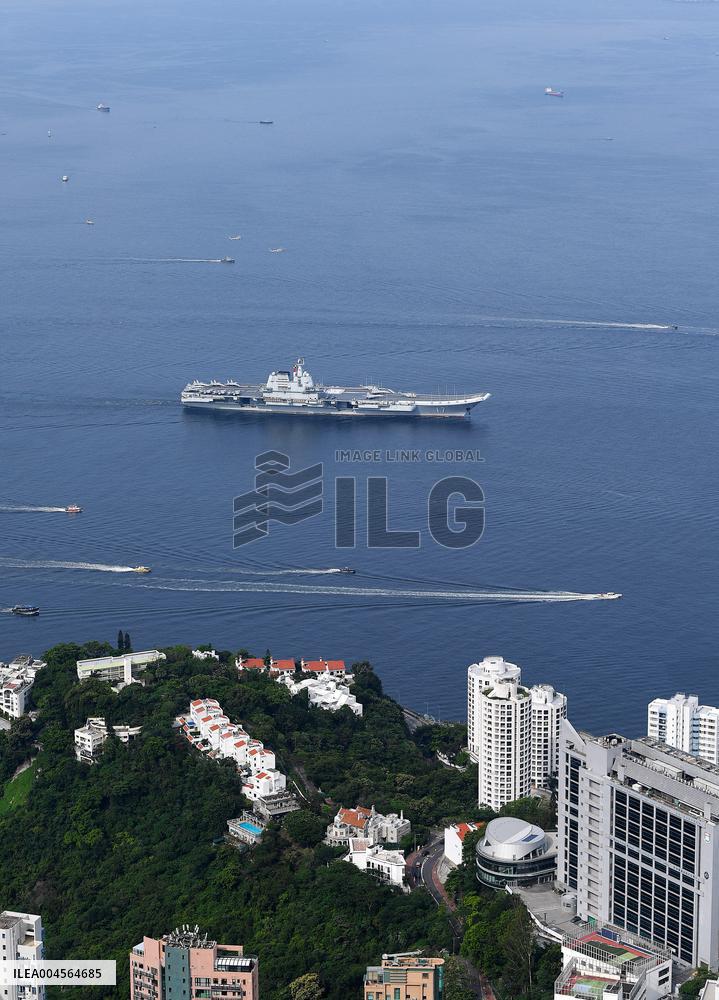 Aircraft Carrier Shandong Sailing In Hong Kong Waters
