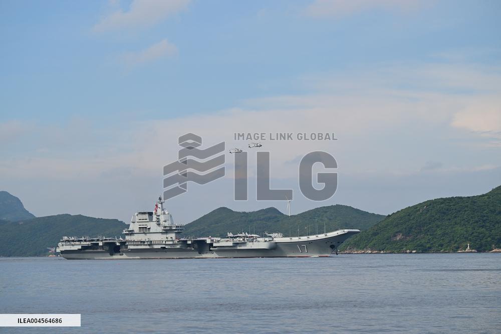 Aircraft Carrier Shandong Sailing In Hong Kong Waters