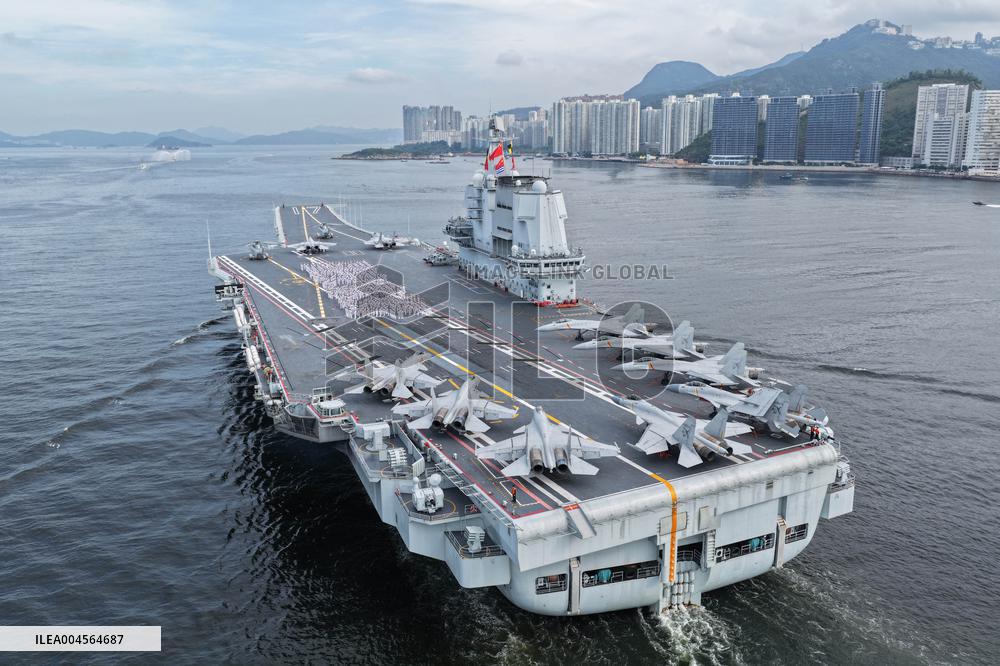Aircraft Carrier Shandong Sailing In Hong Kong Waters