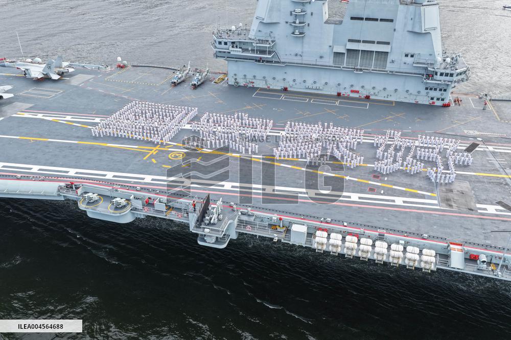 Aircraft Carrier Shandong Sailing In Hong Kong Waters