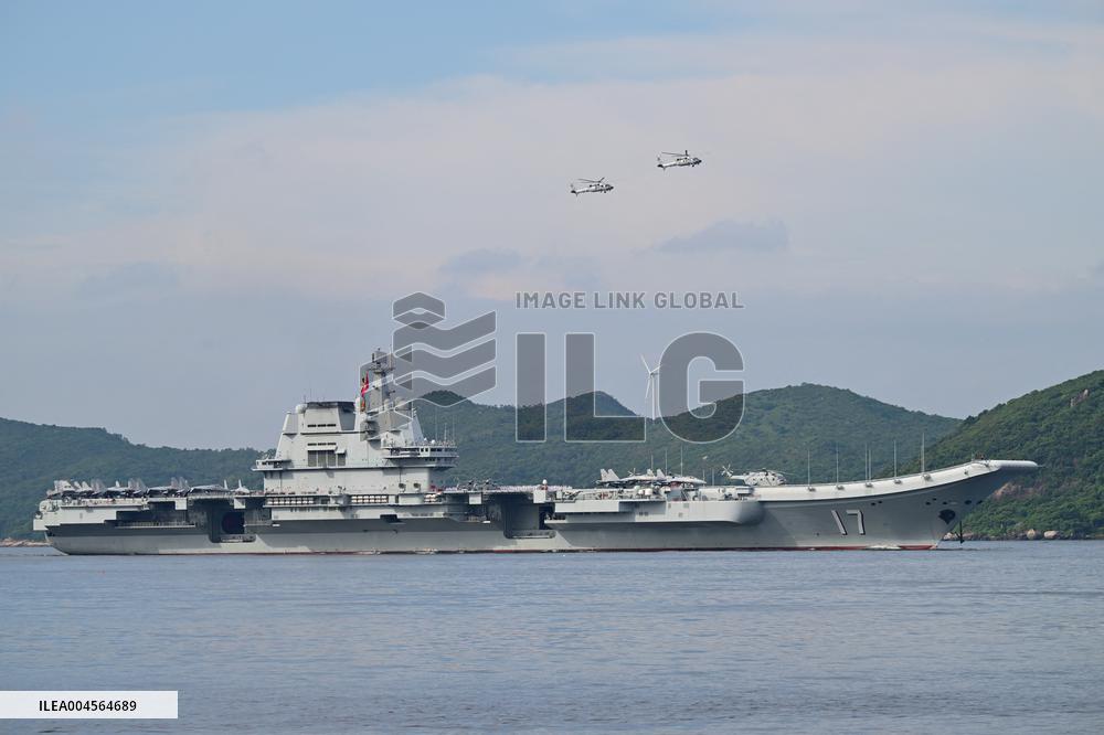 Aircraft Carrier Shandong Sailing In Hong Kong Waters