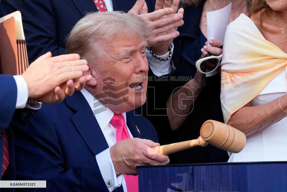 Trump Signs Tax Bill And Watches July 4th Parade