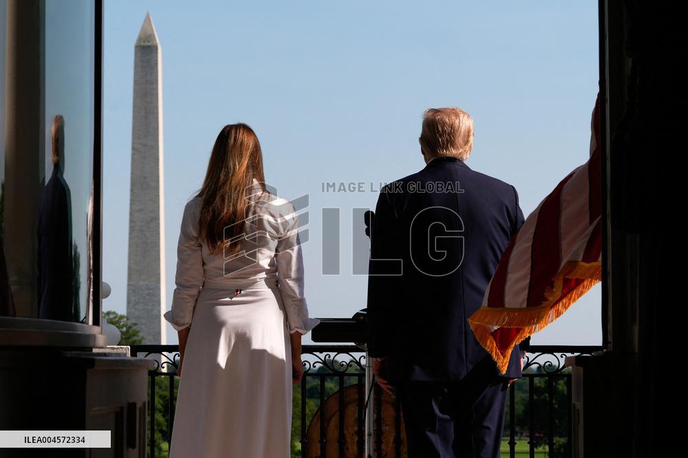 Trump Signs Tax Bill And Watches July 4th Parade
