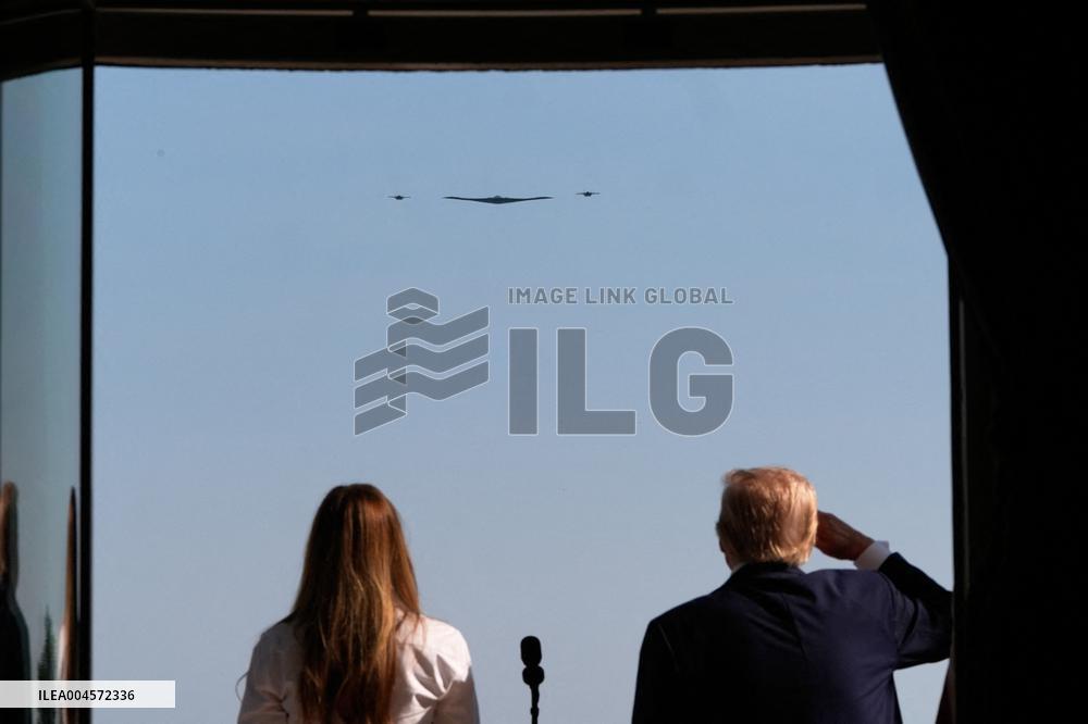 Trump Signs Tax Bill And Watches July 4th Parade