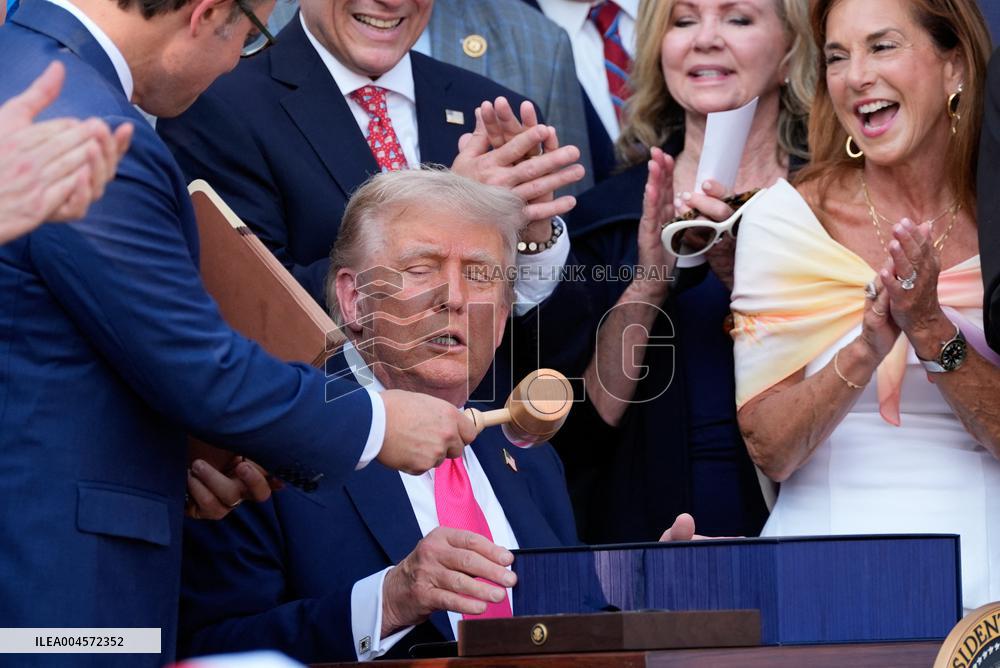 Trump Signs Tax Bill And Watches July 4th Parade