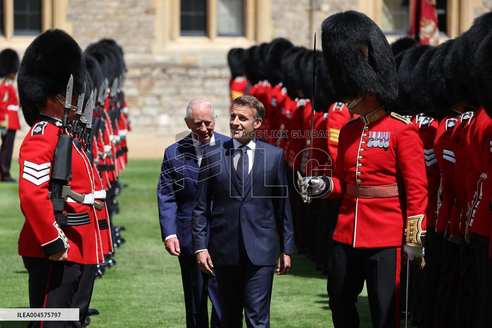 Emmanuel And Brigitte Macron Attend Welcoming Ceremony - Windsor