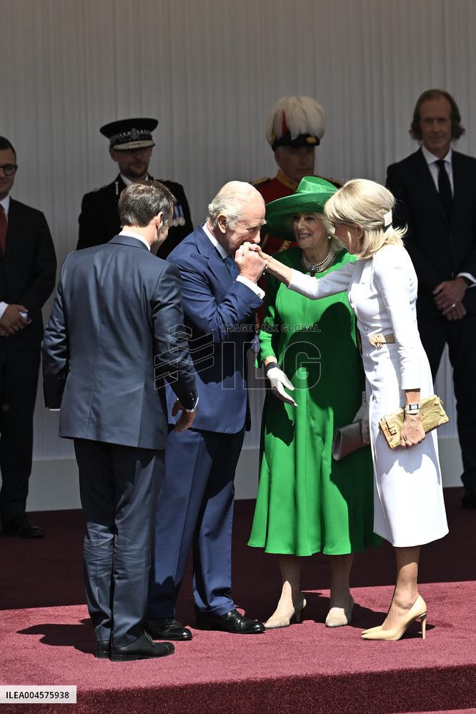 Emmanuel And Brigitte Macron Attend Welcoming Ceremony in Windsor