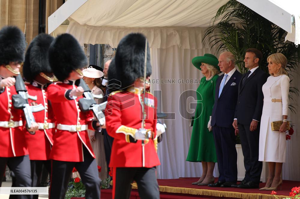 Emmanuel And Brigitte Macron Attend Welcoming Ceremony - Windsor