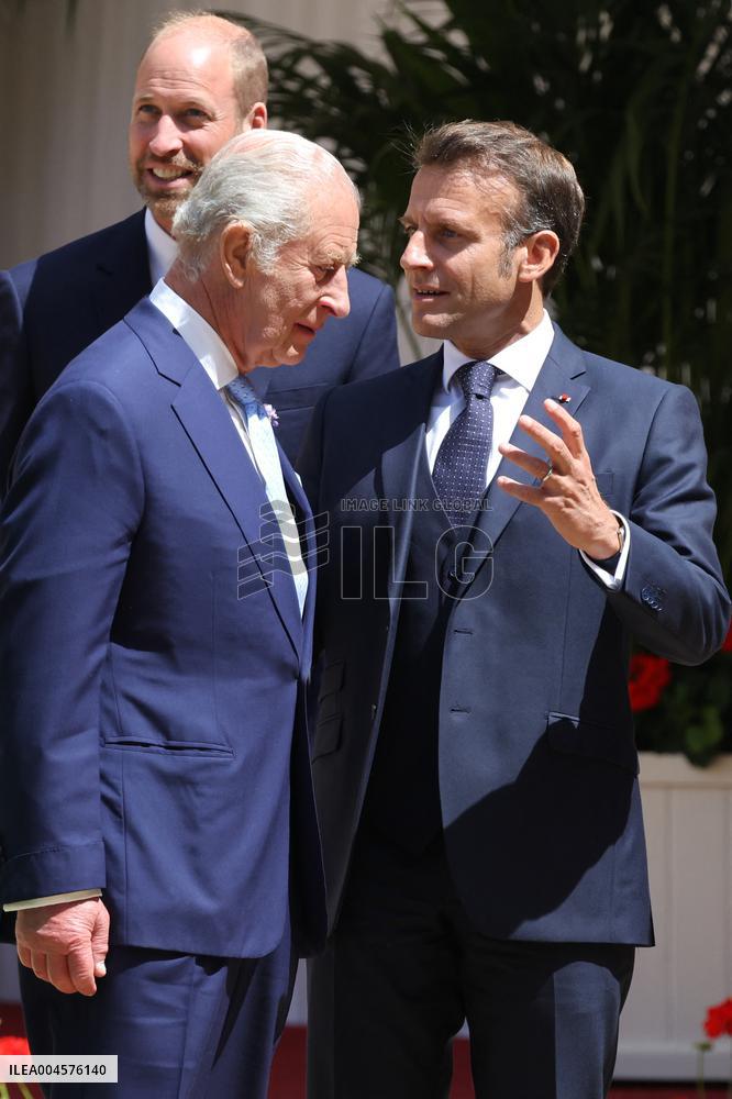 Emmanuel And Brigitte Macron Attend Welcoming Ceremony - Windsor