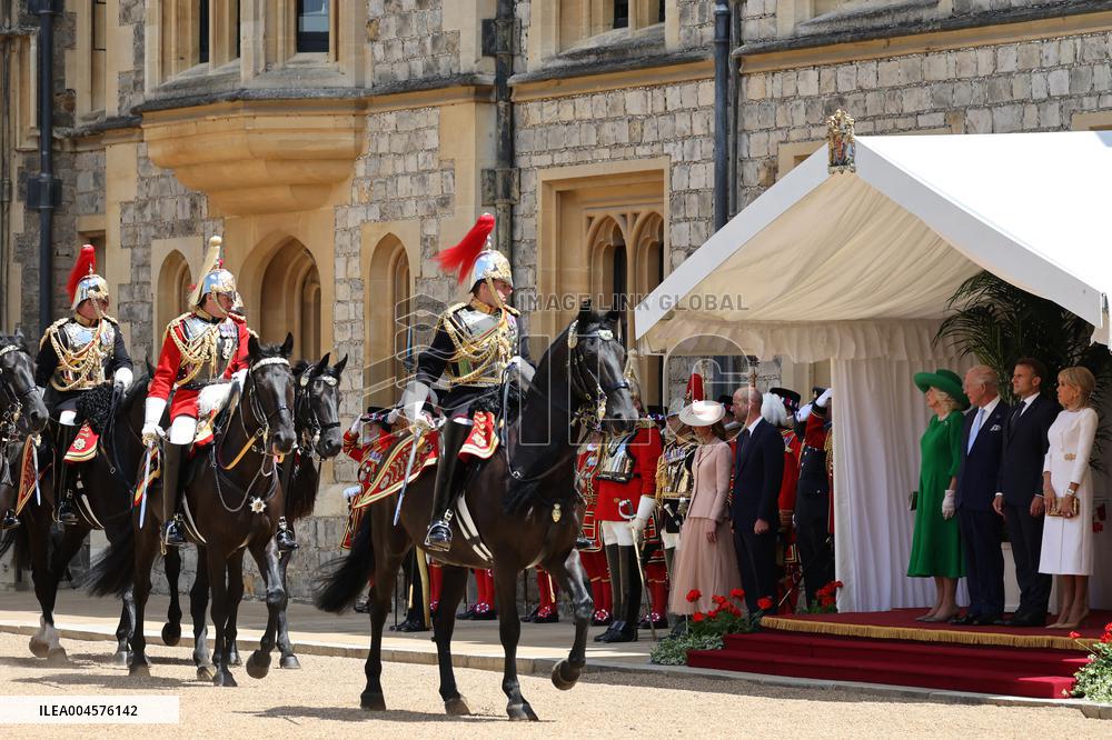 Emmanuel And Brigitte Macron Attend Welcoming Ceremony - Windsor