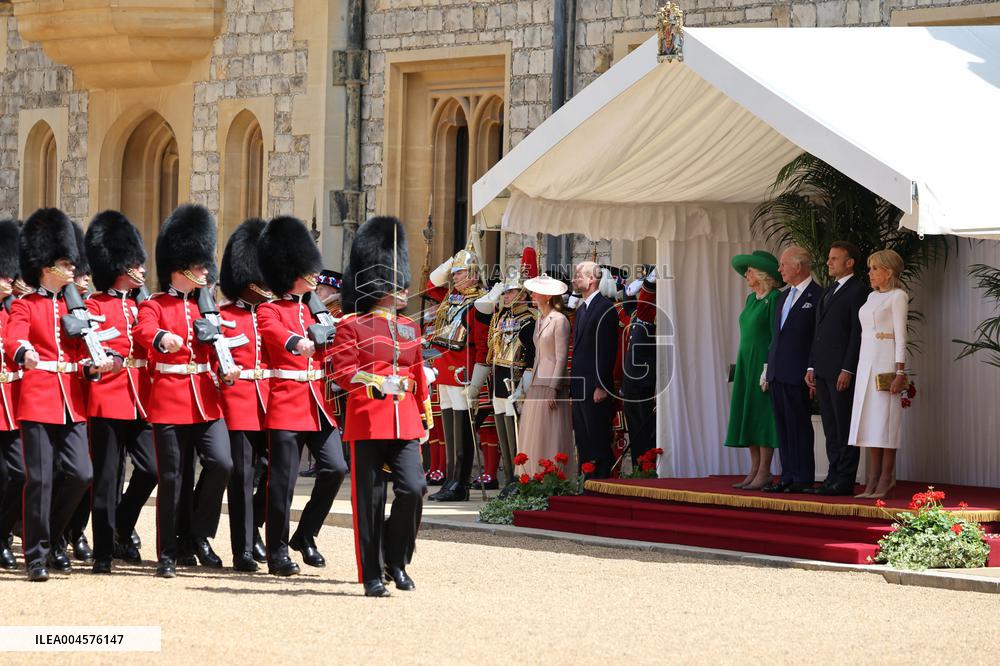 Emmanuel And Brigitte Macron Attend Welcoming Ceremony - Windsor