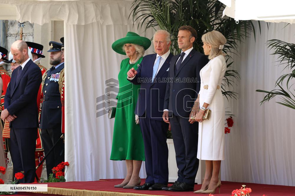 Emmanuel And Brigitte Macron Attend Welcoming Ceremony - Windsor