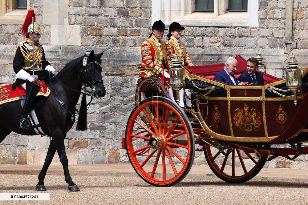 Emmanuel And Brigitte Macron Attend Welcoming Ceremony - Windsor