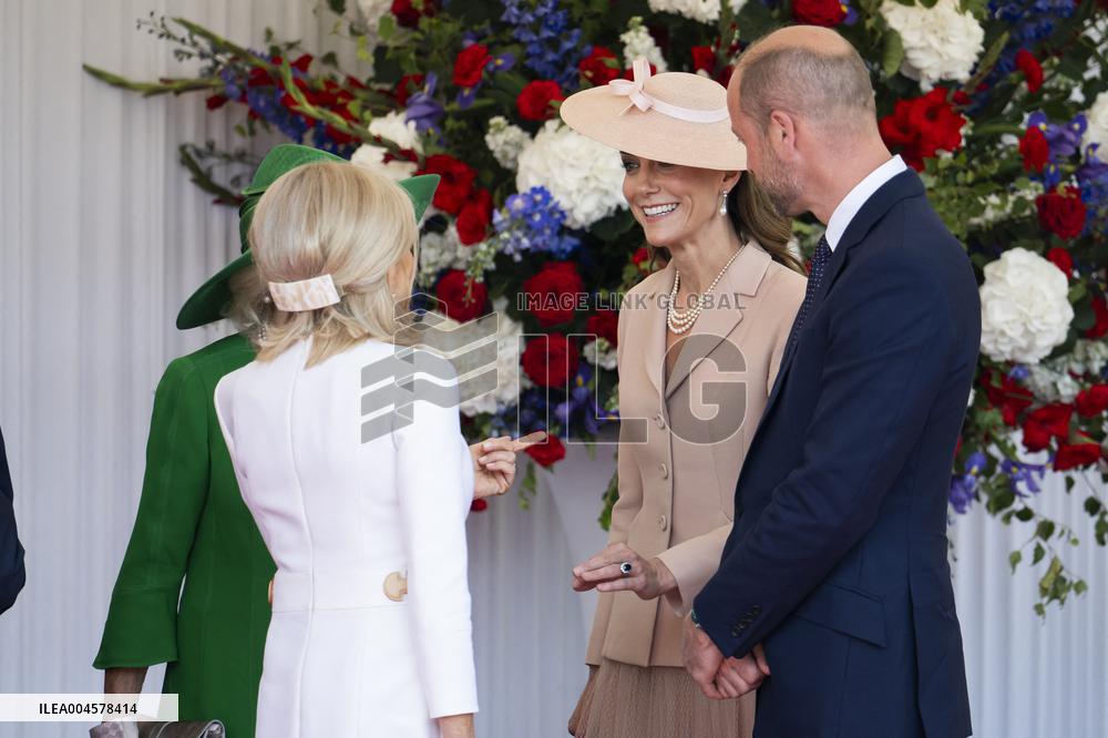 Emmanuel And Brigitte Macron Attend Welcoming Ceremony in Windsor