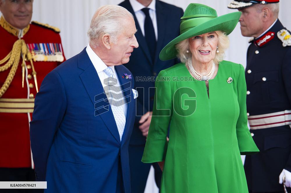 Emmanuel And Brigitte Macron Attend Welcoming Ceremony in Windsor