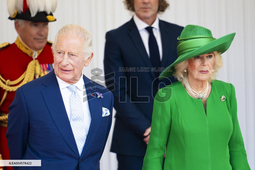 Emmanuel And Brigitte Macron Attend Welcoming Ceremony in Windsor