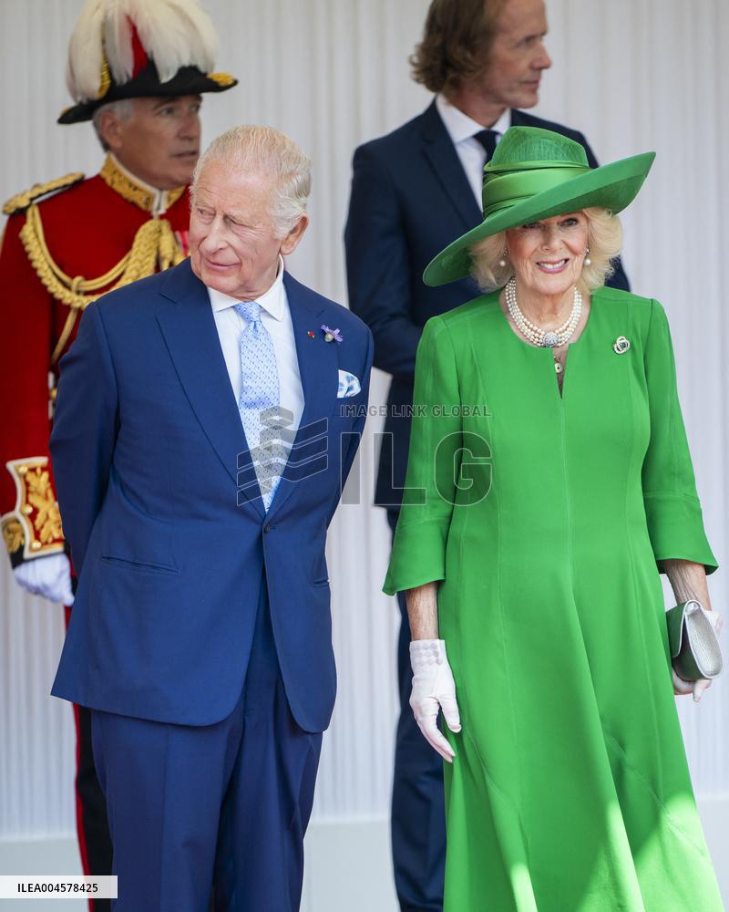 Emmanuel And Brigitte Macron Attend Welcoming Ceremony in Windsor
