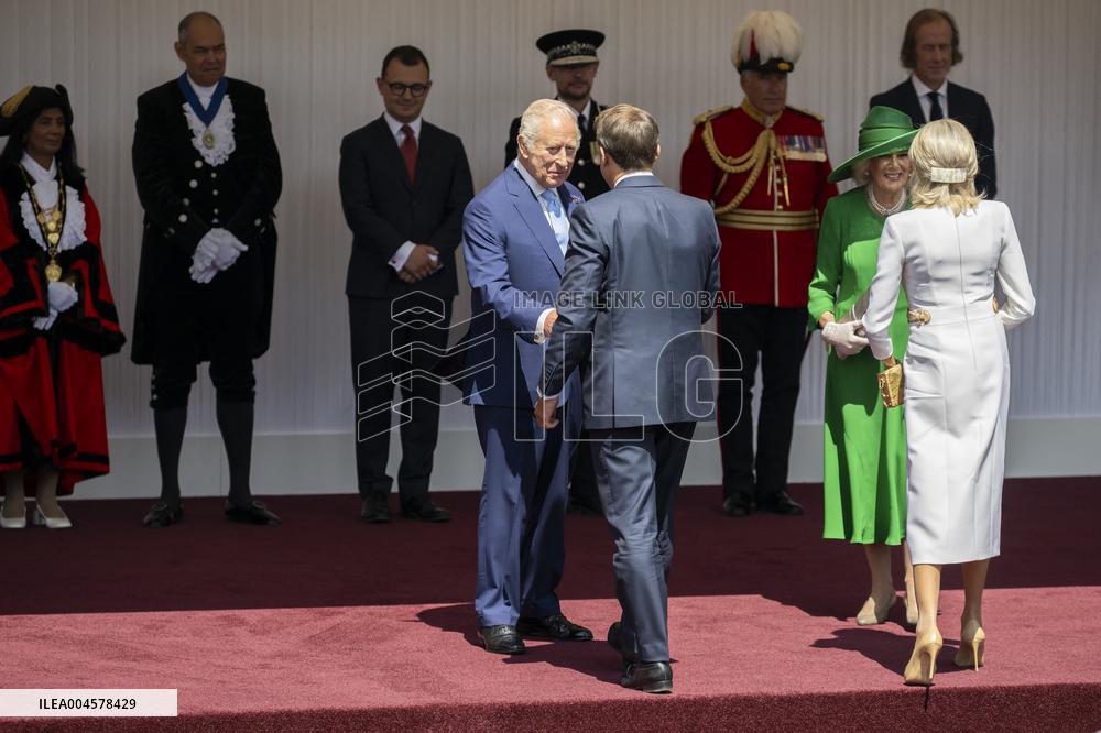 Emmanuel And Brigitte Macron Attend Welcoming Ceremony in Windsor