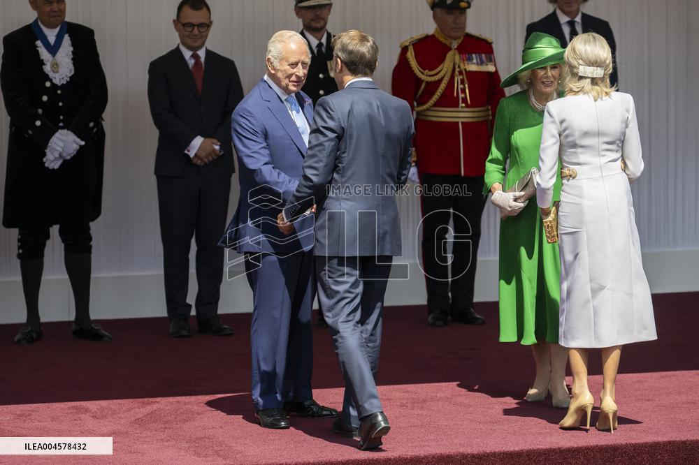 Emmanuel And Brigitte Macron Attend Welcoming Ceremony in Windsor