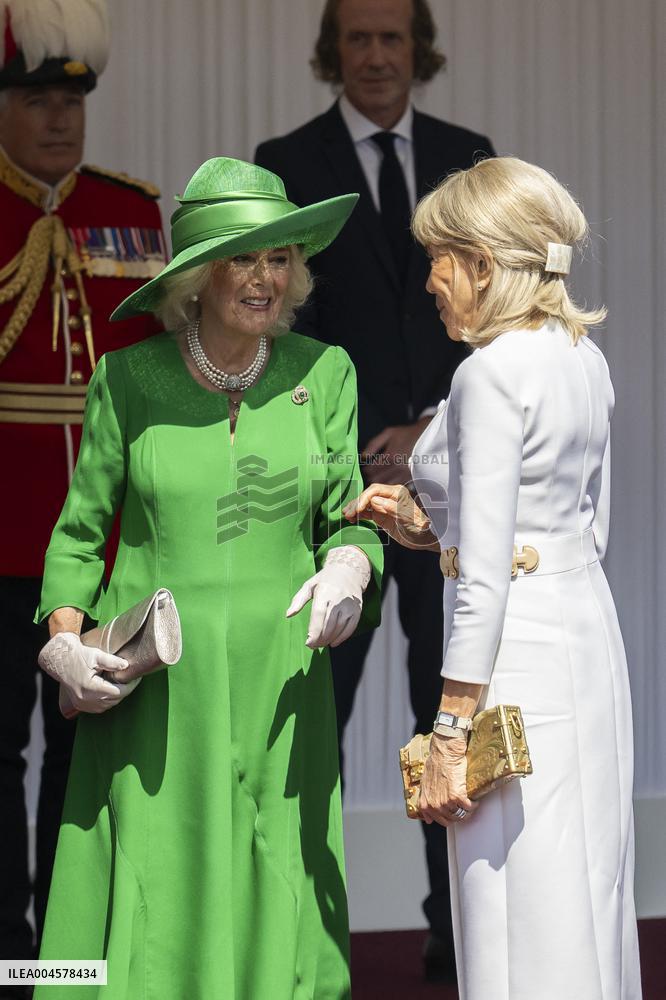 Emmanuel And Brigitte Macron Attend Welcoming Ceremony in Windsor