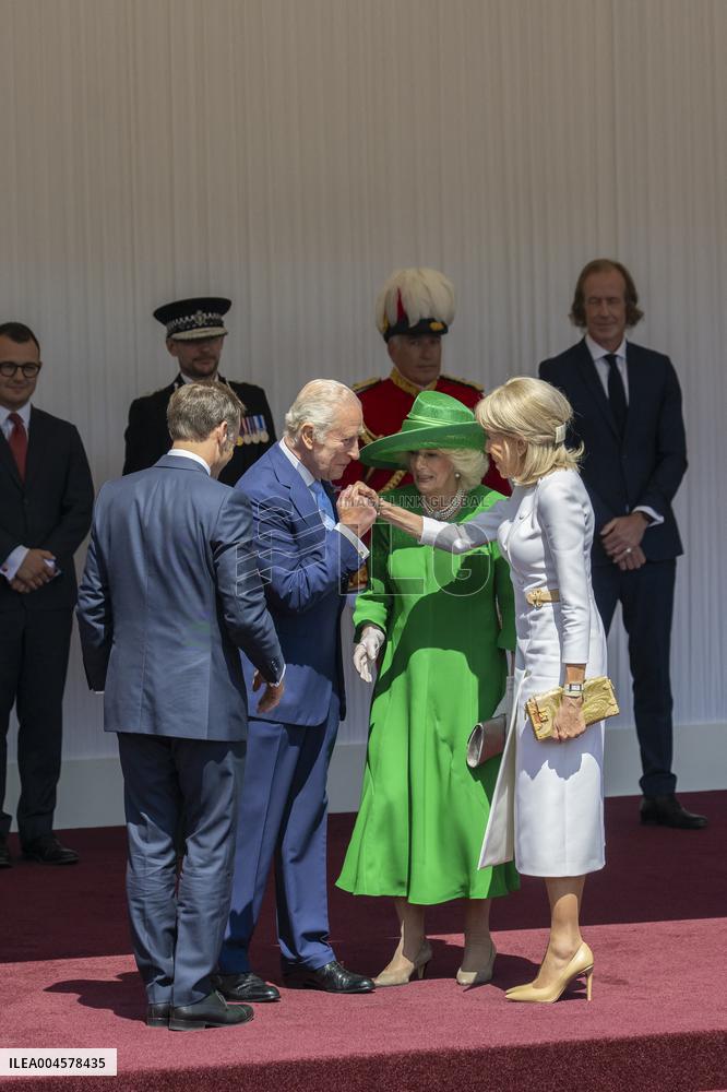 Emmanuel And Brigitte Macron Attend Welcoming Ceremony in Windsor