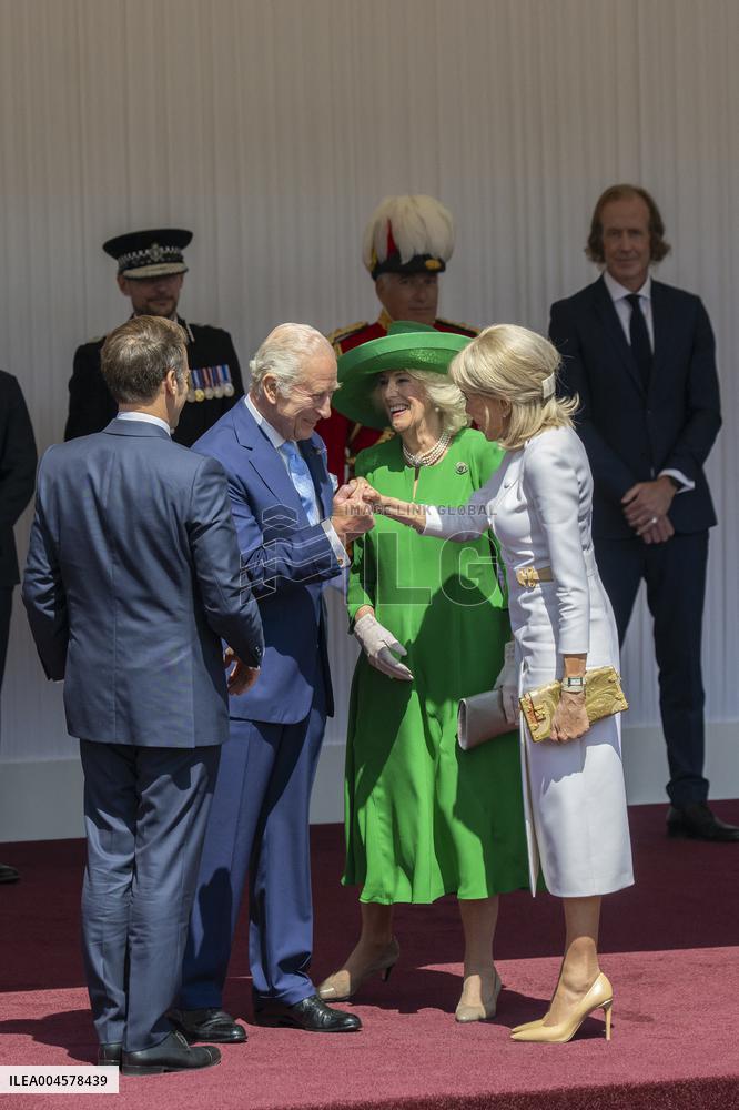 Emmanuel And Brigitte Macron Attend Welcoming Ceremony in Windsor