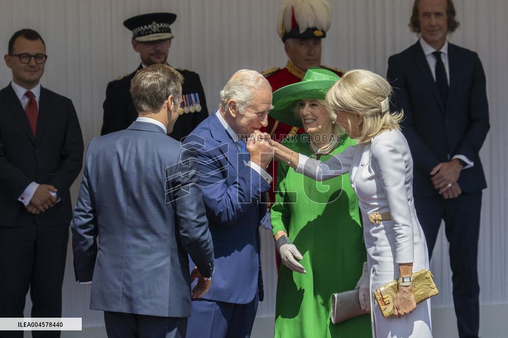 Emmanuel And Brigitte Macron Attend Welcoming Ceremony in Windsor