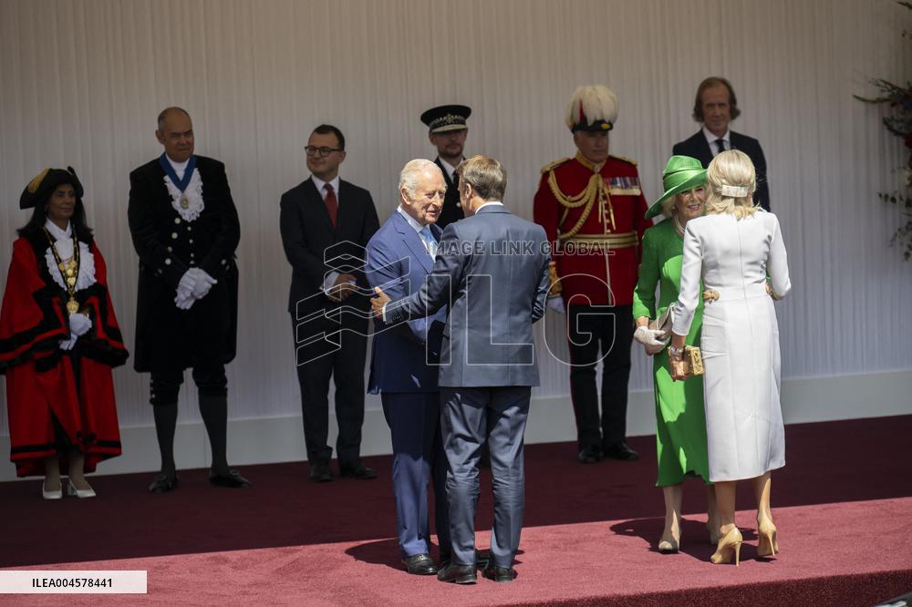 Emmanuel And Brigitte Macron Attend Welcoming Ceremony in Windsor