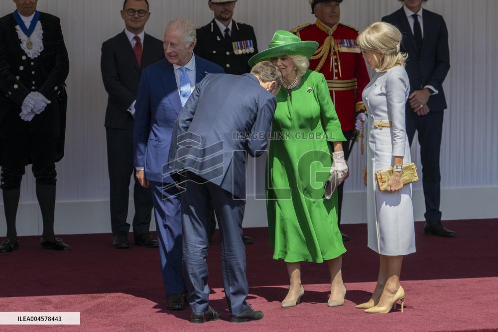 Emmanuel And Brigitte Macron Attend Welcoming Ceremony in Windsor