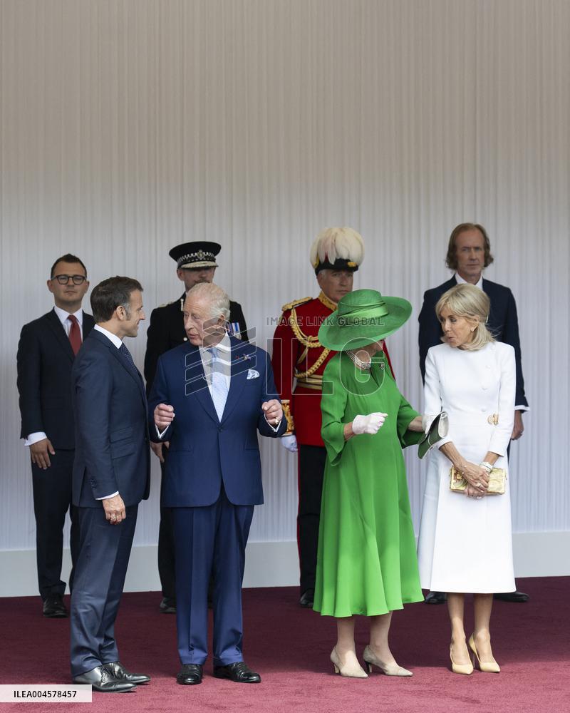 Emmanuel And Brigitte Macron Attend Welcoming Ceremony in Windsor