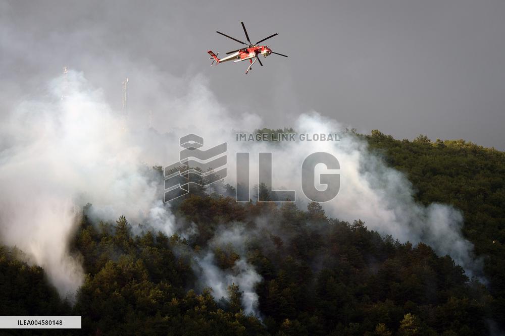 Air Rescue Operations During a Mountain Fire - Italy