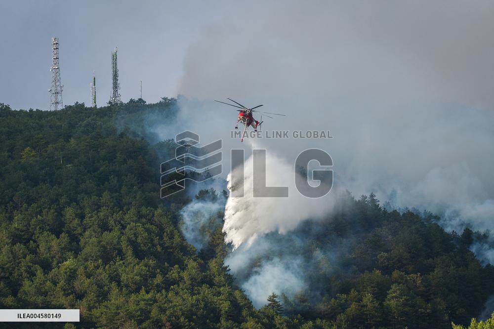 Air Rescue Operations During a Mountain Fire - Italy