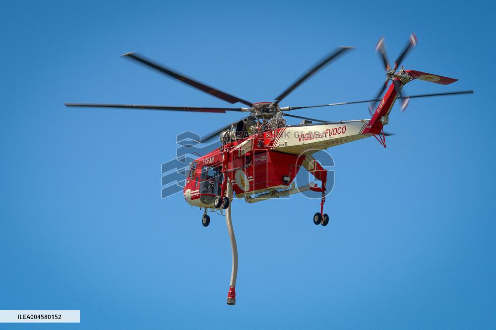 Air Rescue Operations During a Mountain Fire - Italy