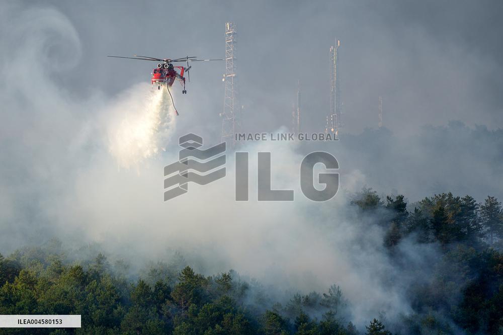 Air Rescue Operations During a Mountain Fire - Italy