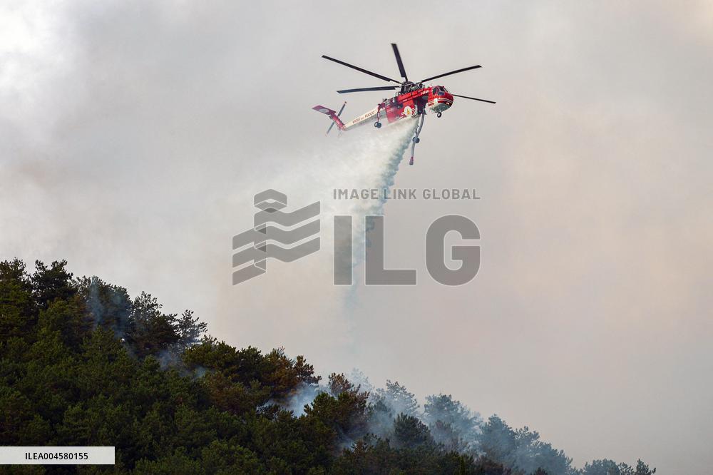 Air Rescue Operations During a Mountain Fire - Italy