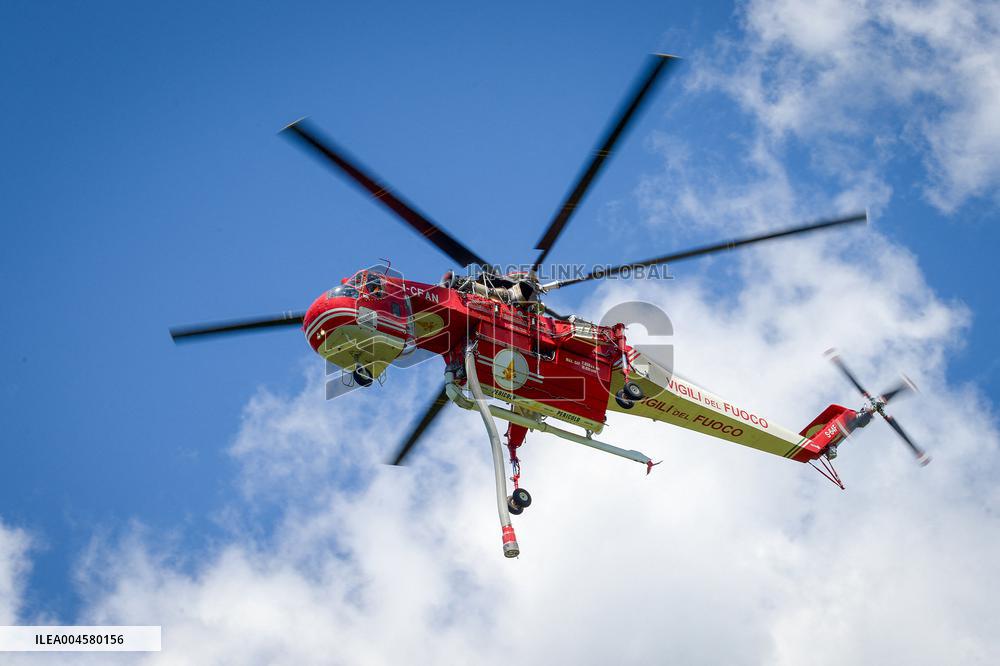 Air Rescue Operations During a Mountain Fire - Italy